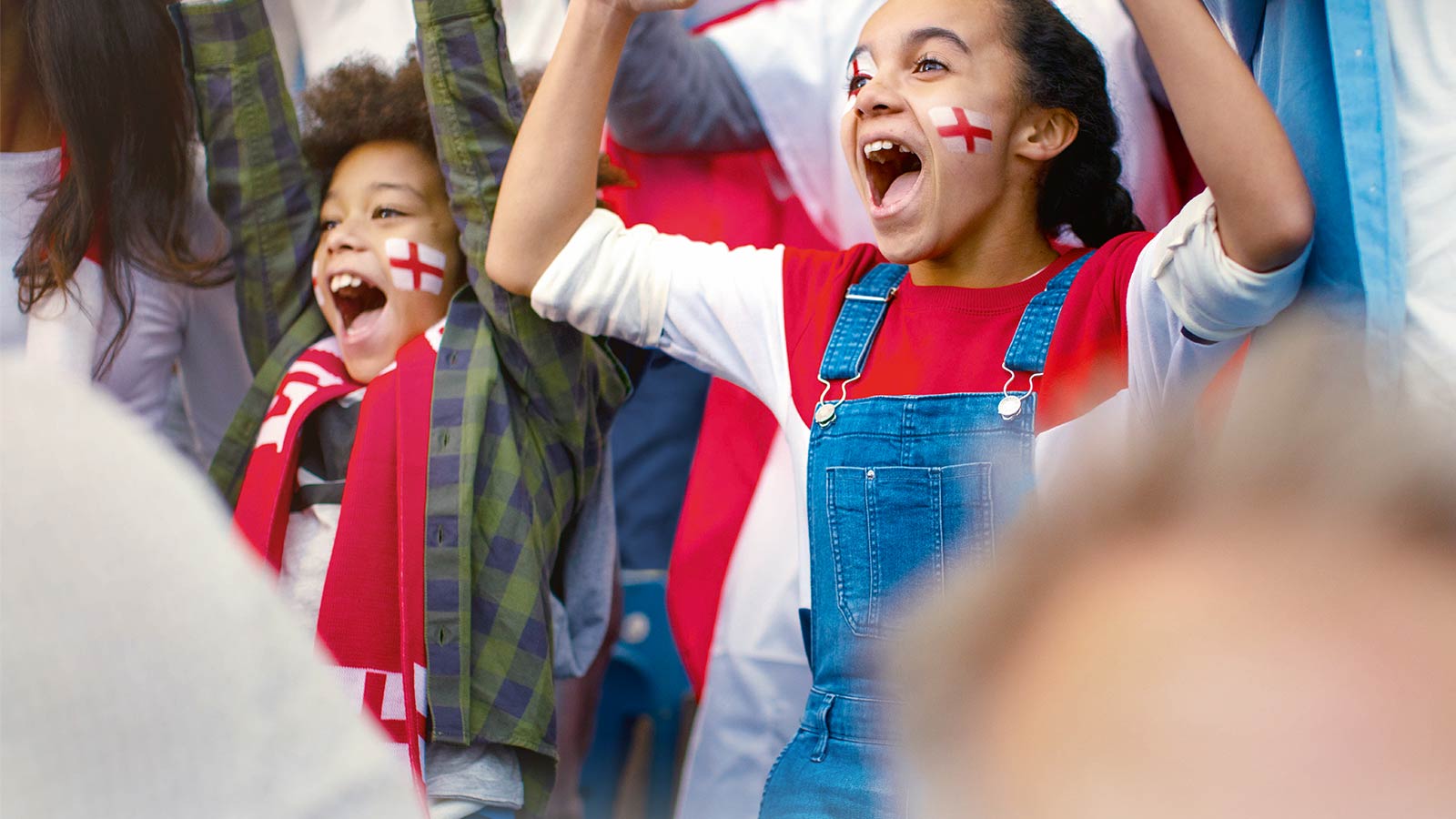 Kids cheer on the England football team at the FIFA Women's World Cup.