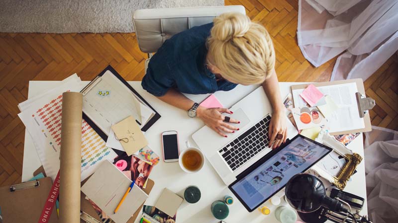 Business Woman Working on her Laptop